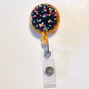 Retractable badge holder
